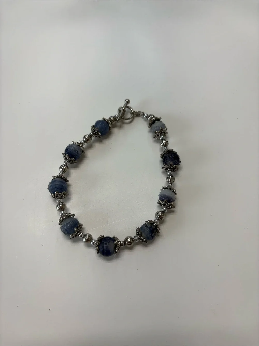 Silver Beaded Bracelet with Blue Gemstone Accents